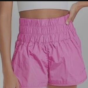 FREE PEOPLE PINK RUNNING SHORTS